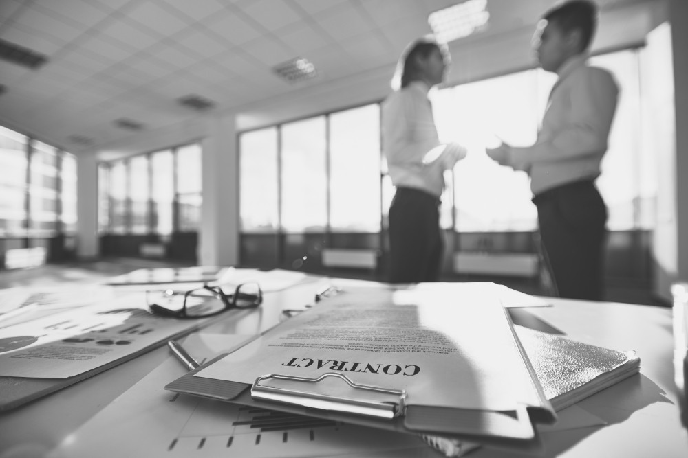 Las Vegas litigation lawyer reviewing business contract dispute documentation