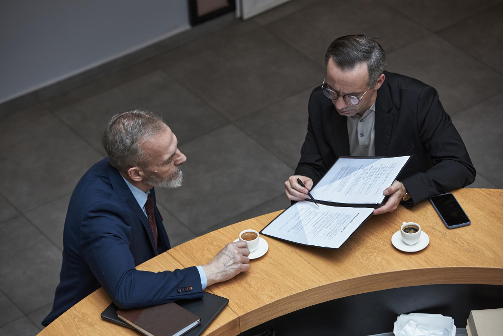 common-legal-mistakes-nevada-businesses-individuals Nevada attorney advising a business owner and individual about common legal mistakes and proactive legal planning