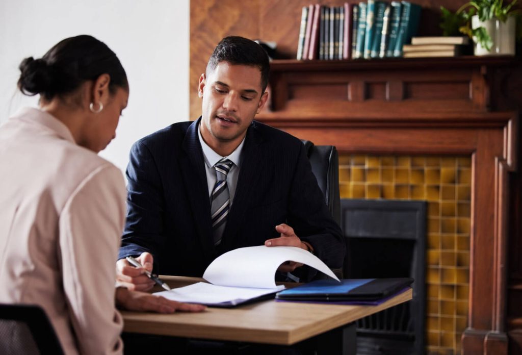 Reno wrongful termination lawyer reviewing employee workplace retaliation claim