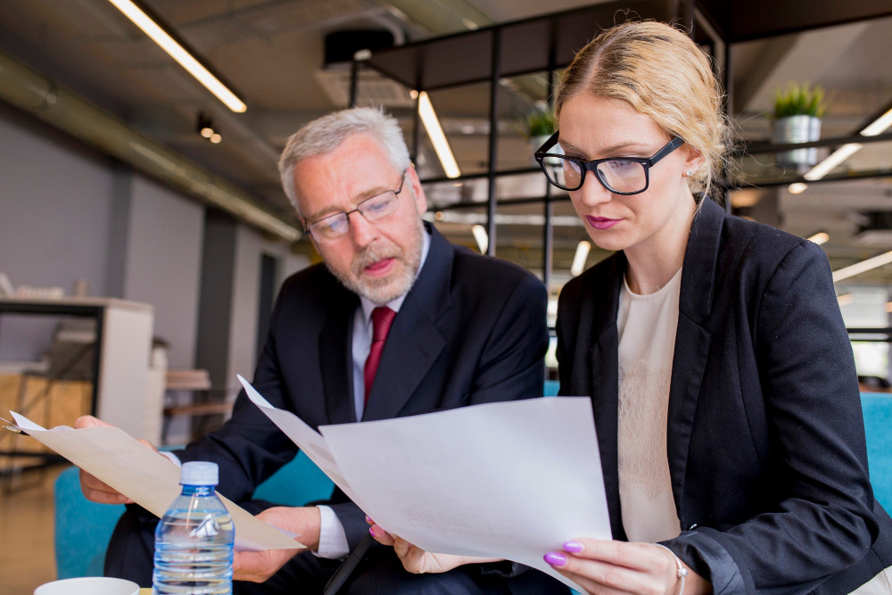 Attorney reviewing legal documents with a Nevada client before signing an important agreement
