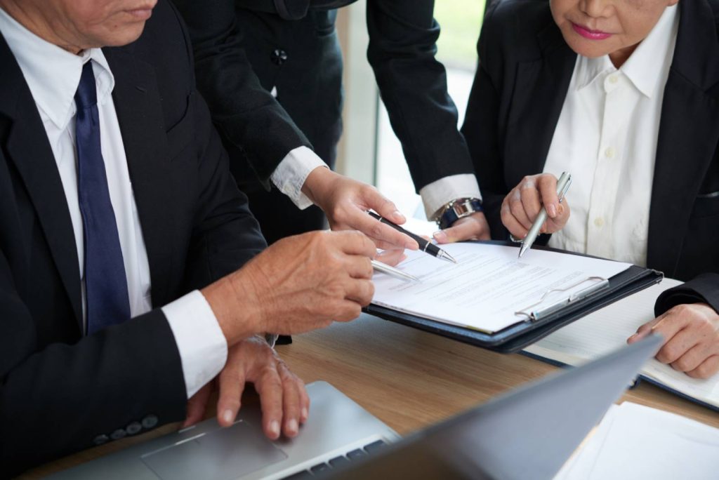 Attorney meeting with a client to explain the legal process in Nevada.