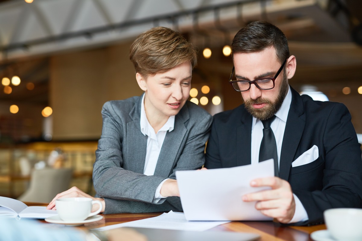 Entrepreneur reviewing a legal business formation checklist before launching a company in Nevada.