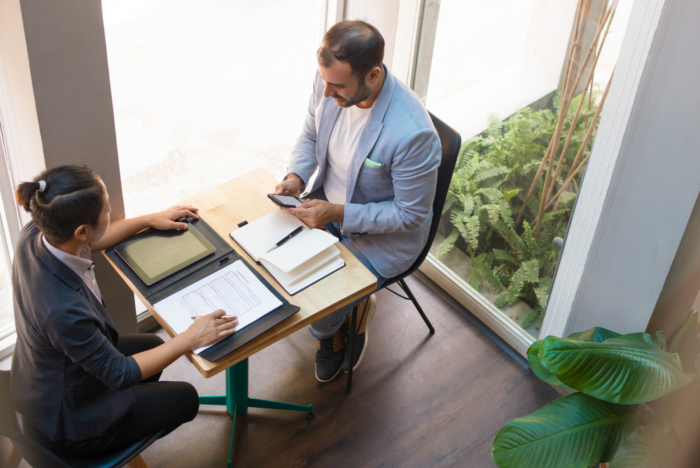 Business law attorney consulting with entrepreneurs about contract drafting in Nevada.