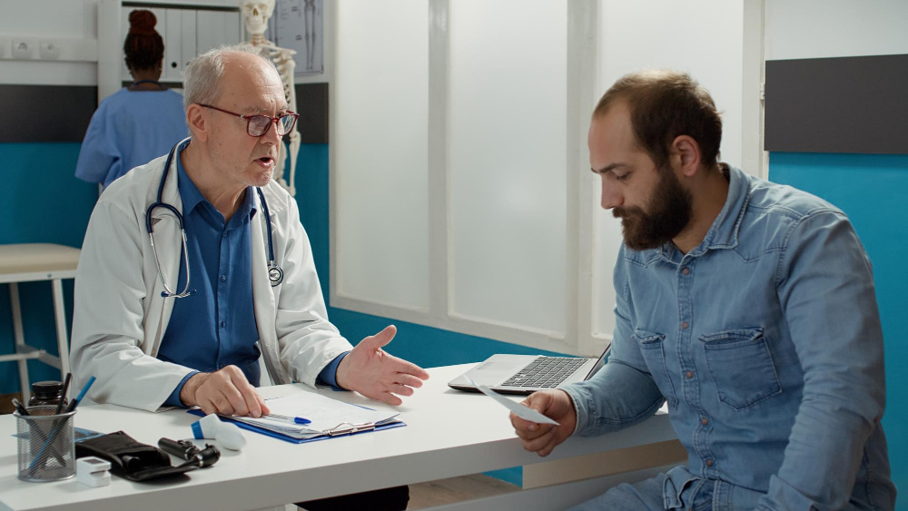 Doctor consulting with a patient during a medical examination in Nevada.