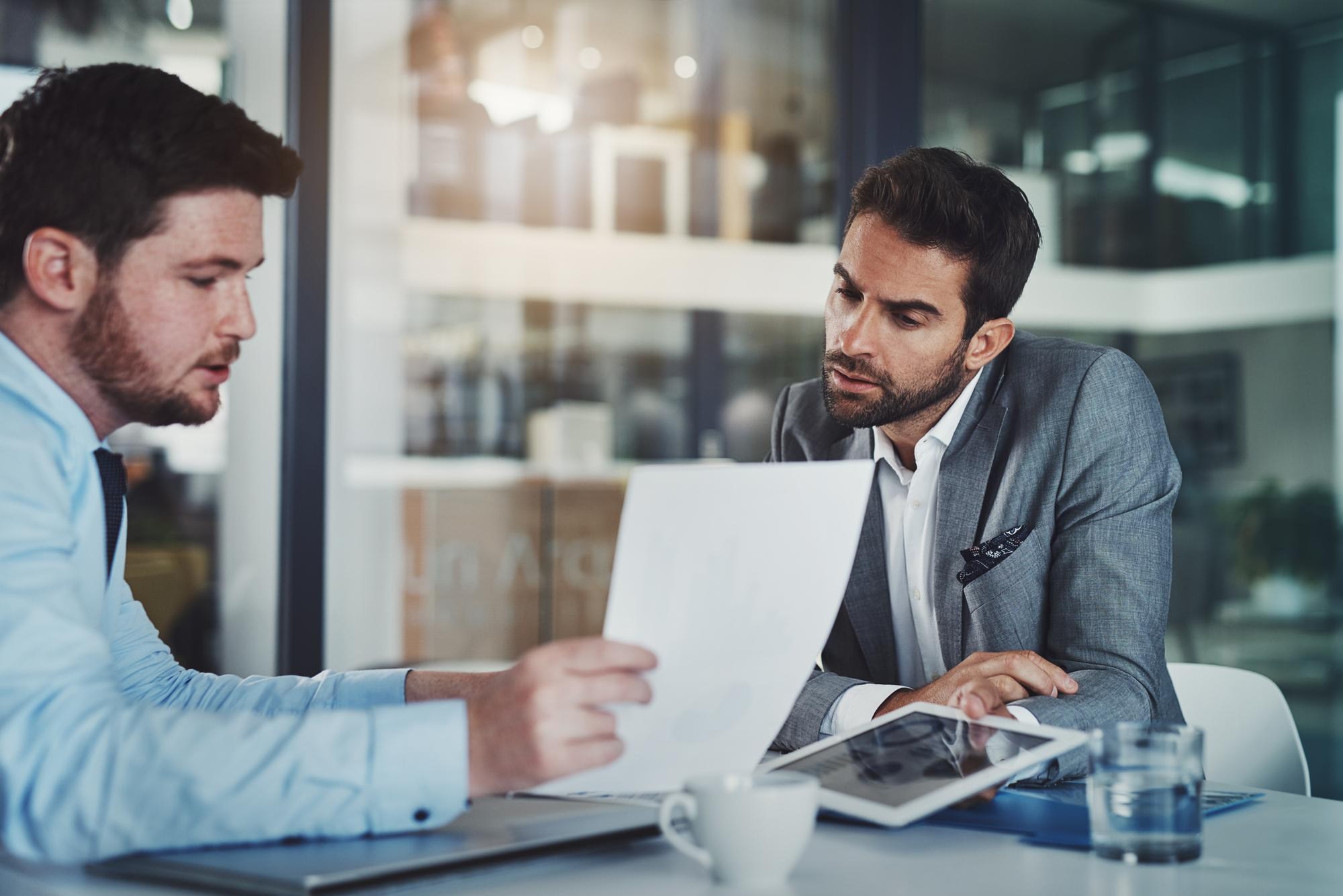 employee-vs-independent-contractor-nevada Employee discussing possible independent contractor misclassification with a Nevada employment attorney.