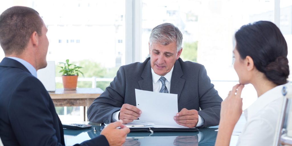 Employment attorney reviewing an employment agreement with an employer and employee in Nevada and California.
