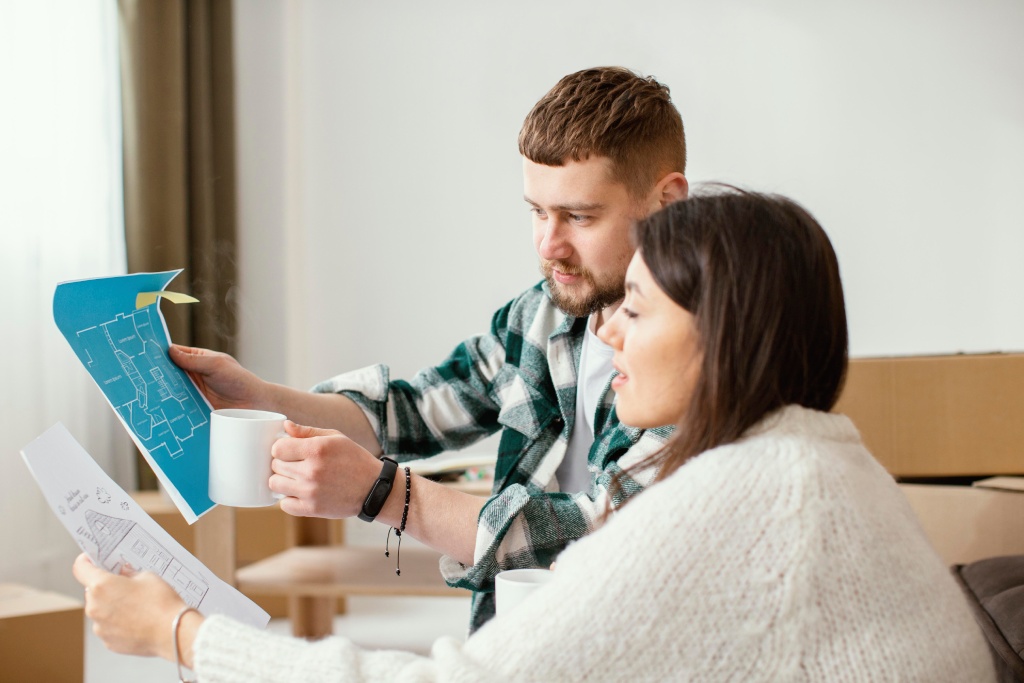 Nevada homeowner reviewing a real estate purchase agreement during a For Sale By Owner transaction.