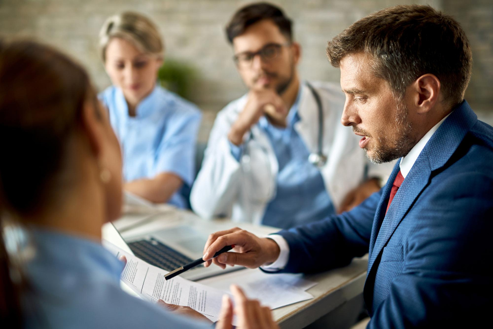 Attorney reviewing medical records for a potential medical malpractice claim.