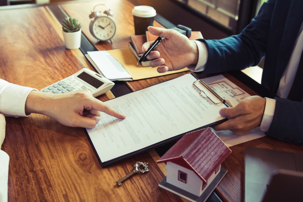 Title search and escrow documents prepared for a Nevada residential real estate closing.