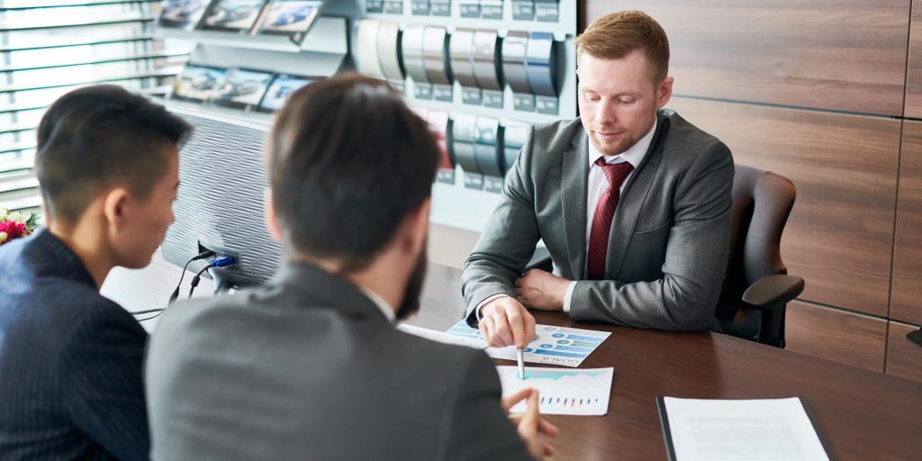 Employment attorney discussing workplace policies with business owners in Nevada and California.