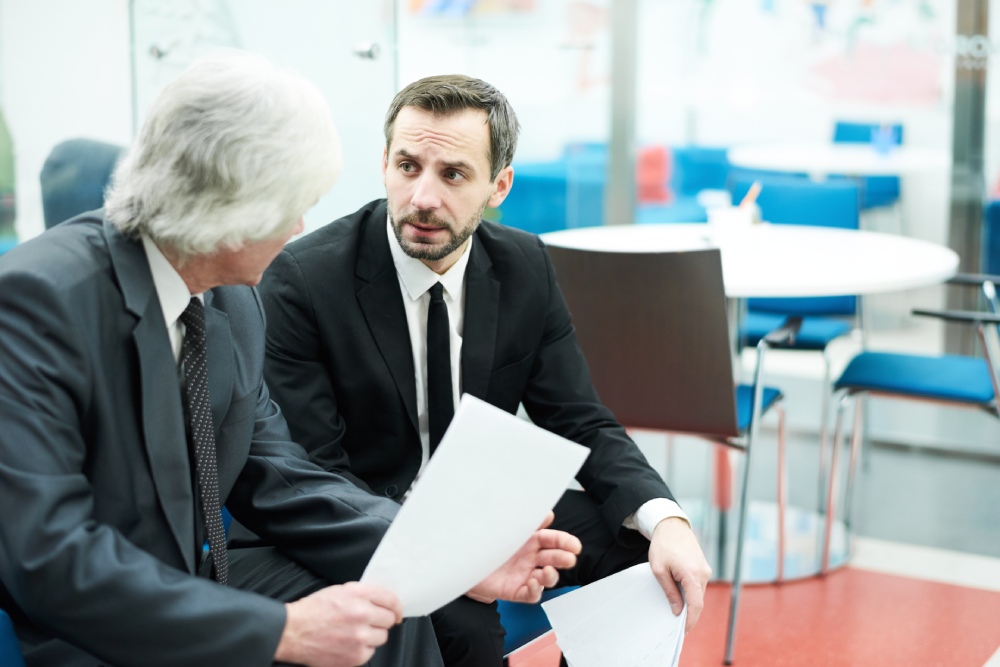 Nevada business attorney discussing LLC and corporation structures with a business owner.