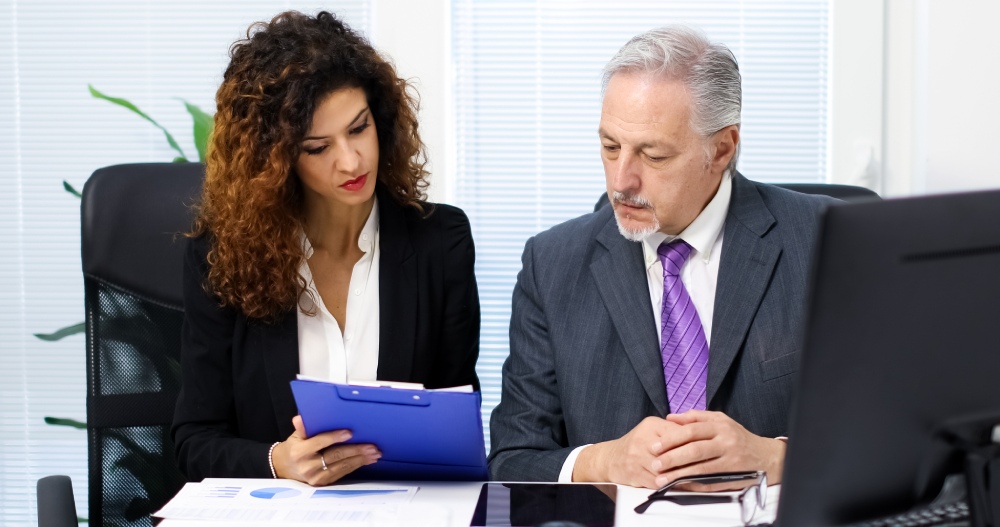 Nevada employee discussing pay and work schedule concerns with an employment attorney.