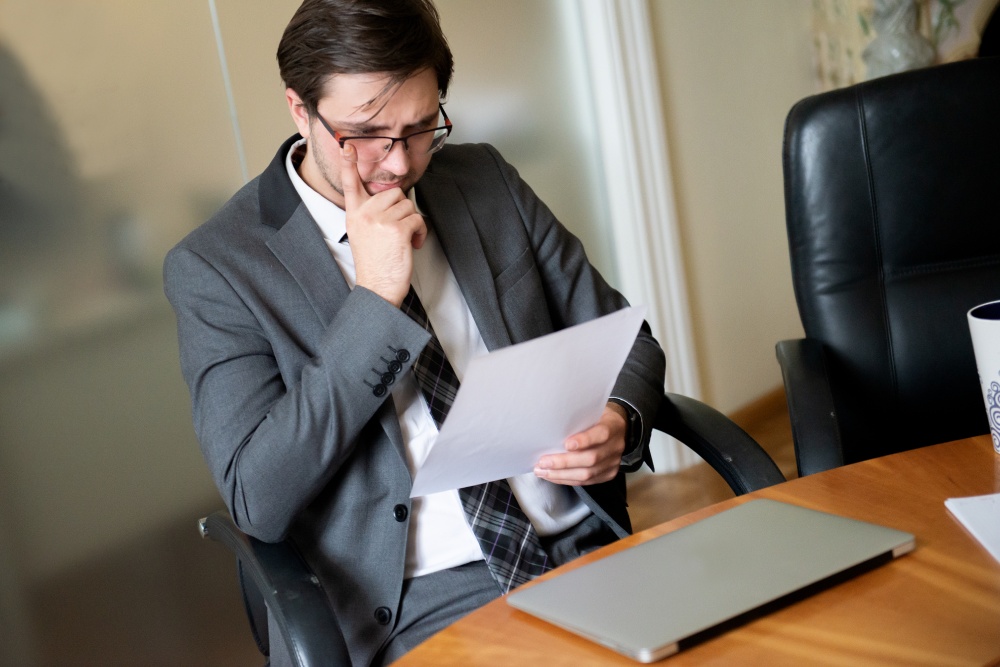 Nevada business owner reviewing a NERC charge of discrimination notice