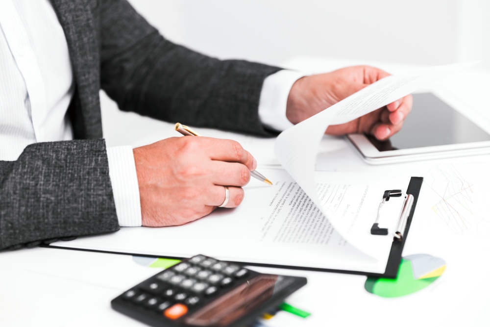 Nevada estate planning documents on a desk: a handwritten will, a trust instrument and a probate petition