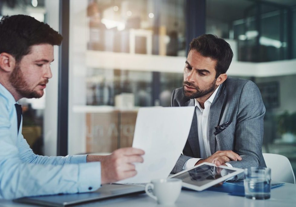 Employee discussing possible independent contractor misclassification with a Nevada employment attorney.