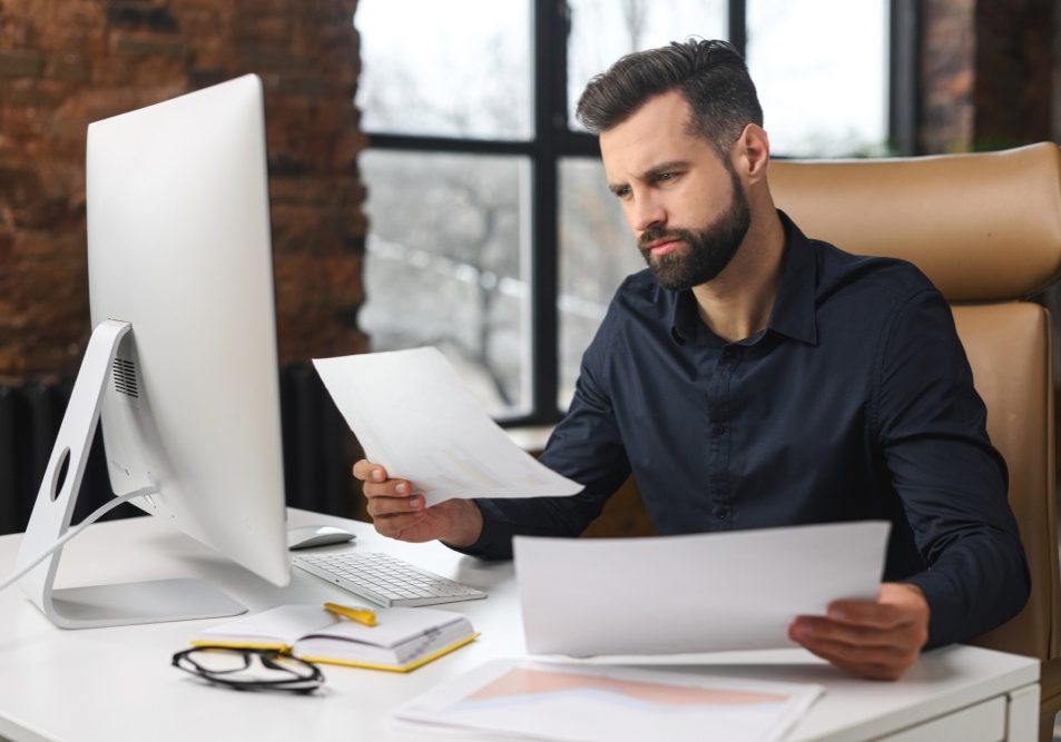 Nevada business owner comparing an LLC and corporation before choosing a business structure.