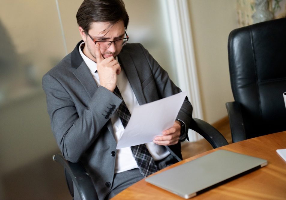 Nevada business owner reviewing a NERC charge of discrimination notice