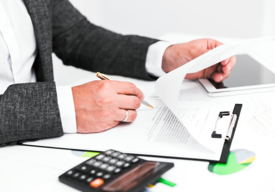 Nevada estate planning documents on a desk: a handwritten will, a trust instrument and a probate petition